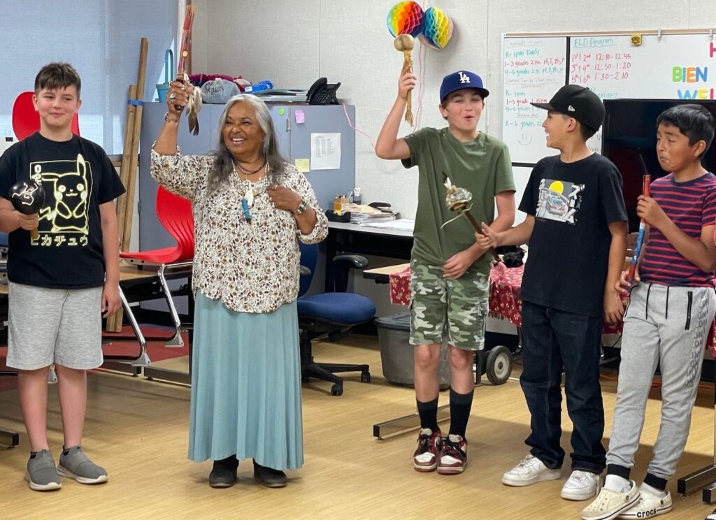 Artist in Residence, Julie Tumamait-Stenslie, making Chumash music with students