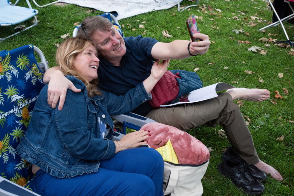 Couple sitting on the lawn